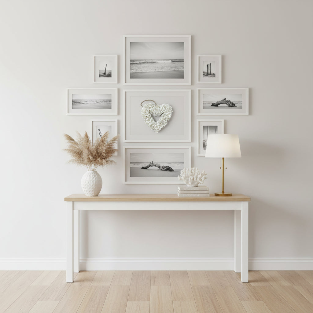 A heart-shaped decorative wreath made of white sea shell flowers.
