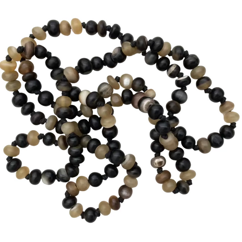 This beautiful, natural buffalo horn is used to make this amazing necklace. So natural, such a soft pallet to add those soft shades of browns, blacks and creams.