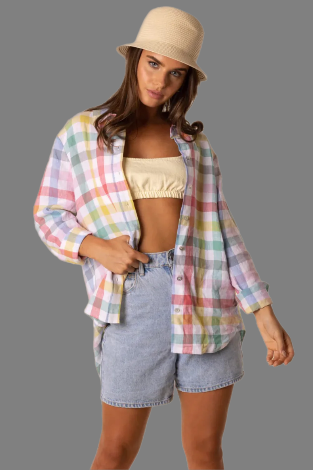 Two Ts 100% linen multi coloured shirt, has long sleeves and cuffs. The back has a longer length than the front.